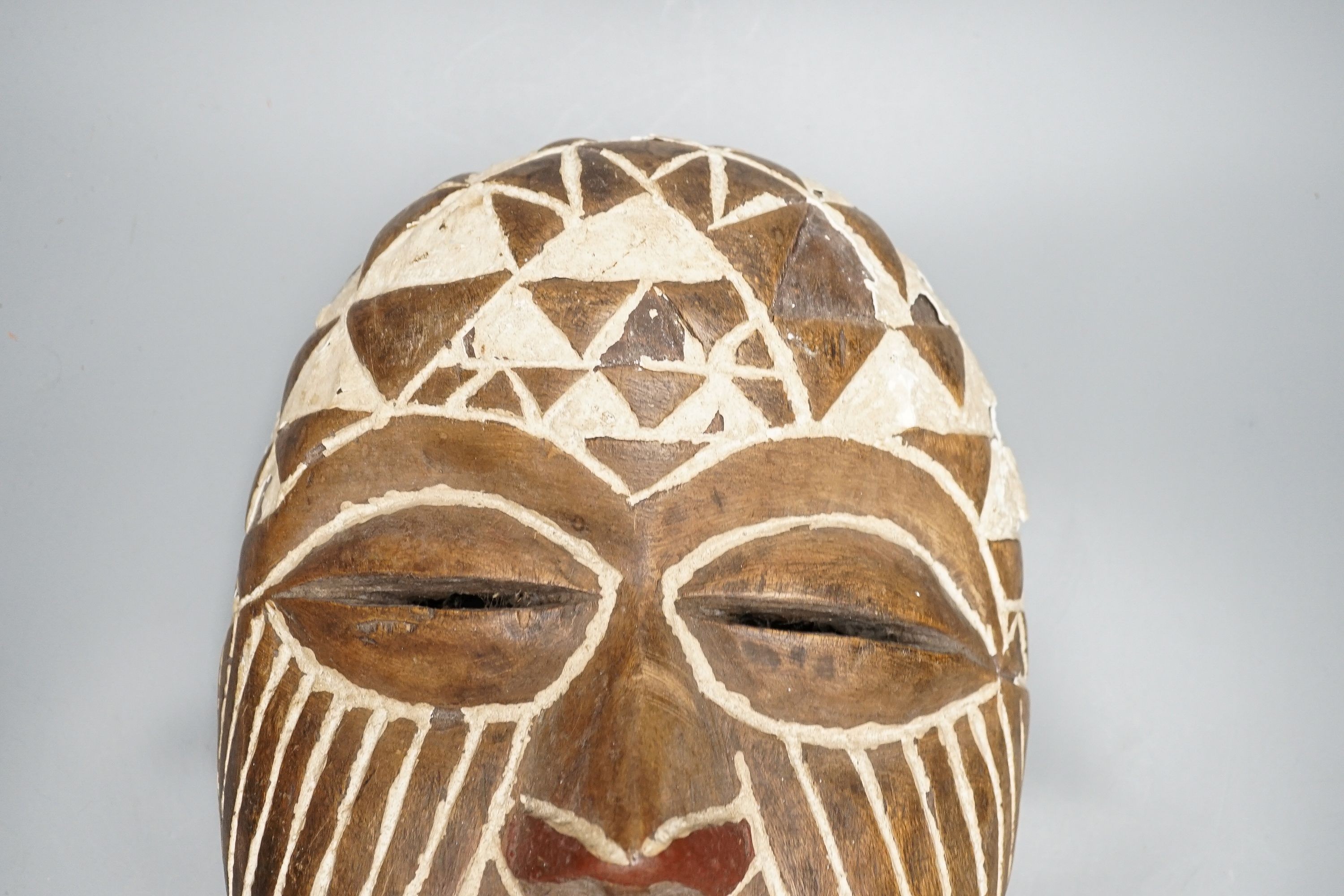 An African tribal mask, height 36cm